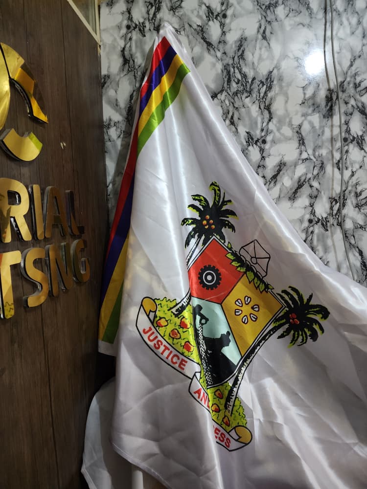 Printed Lagos State ceremonial flag with the state coat of arms and Justice and Progress ribbon
