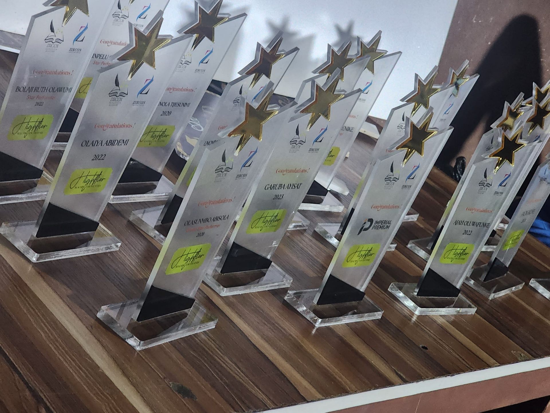 Row of acrylic star-topped recognition awards produced for Zircon Initiatives Highflier programme