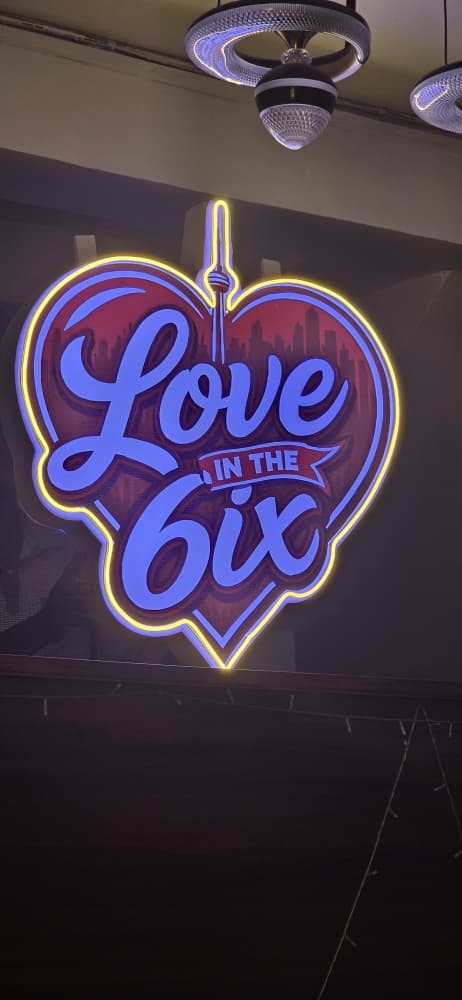 Custom neon heart sign reading Love in the 6ix