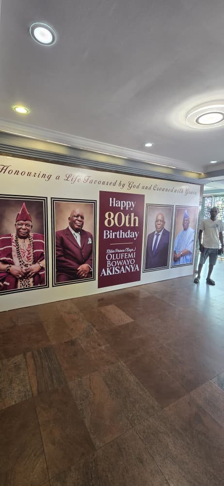 Happy 80th Birthday tribute wall installation honouring Elder Praise Bowayo Akisanya