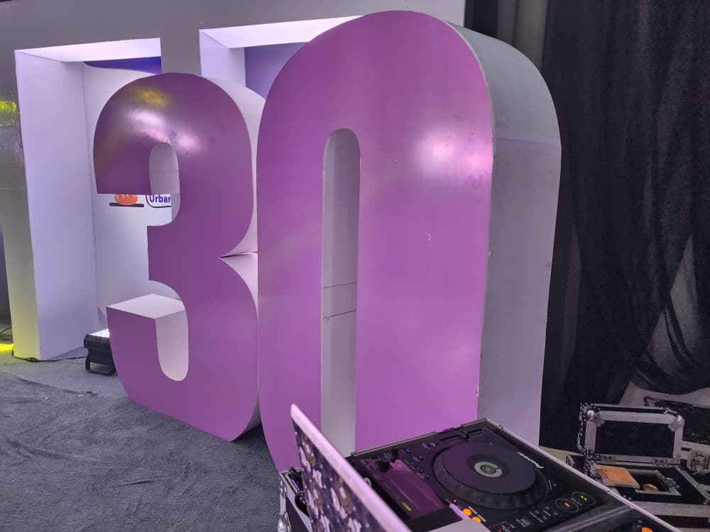 Oversized purple three-dimensional number 30 milestone birthday stage prop