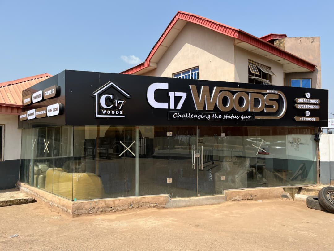 Full storefront facade branding and 3D illuminated signage for C17 Woods furniture showroom
