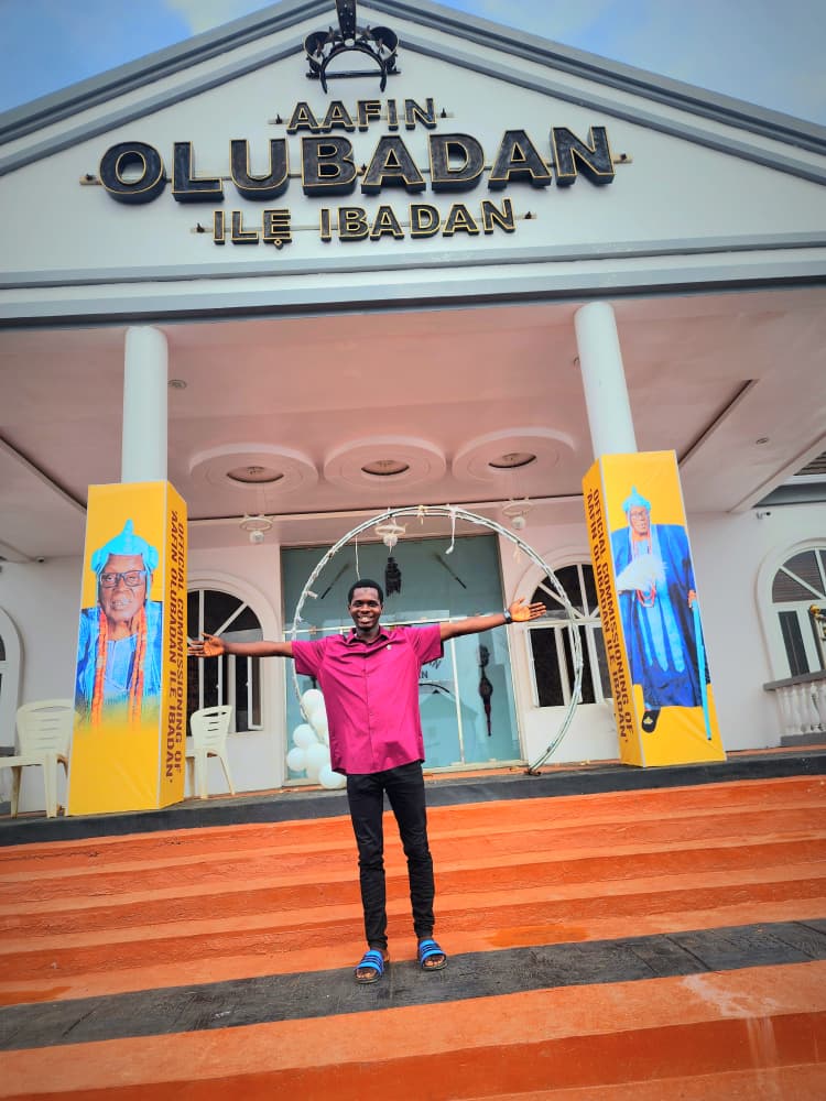 Aafin Olubadan Ilé Ìbàdàn palace entrance signage with royal portrait pillar wraps for the Olubadan coronation