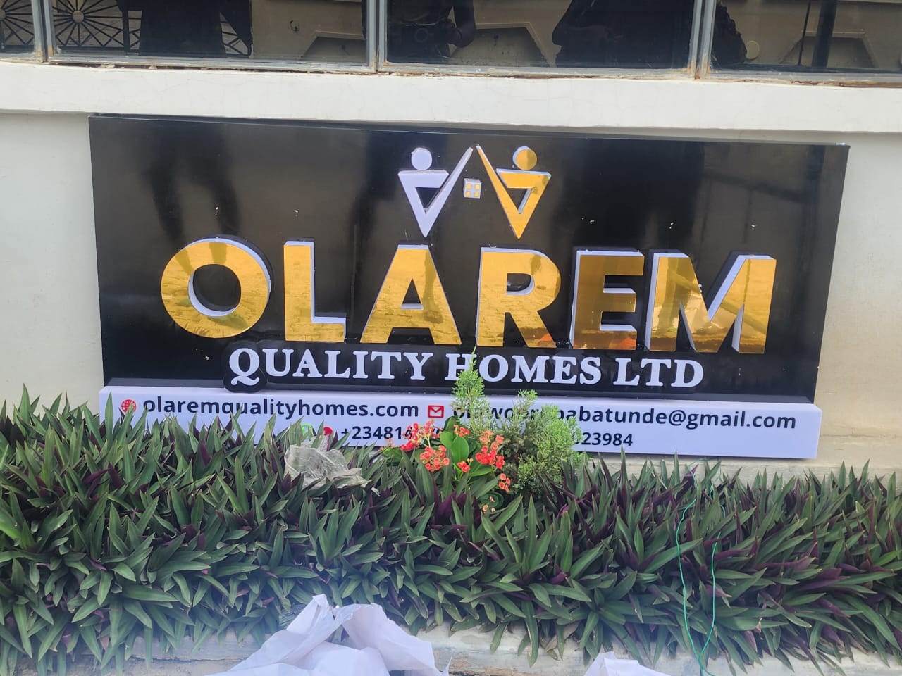 Polished black and gold 3D Olarem Quality Homes Ltd facade signage