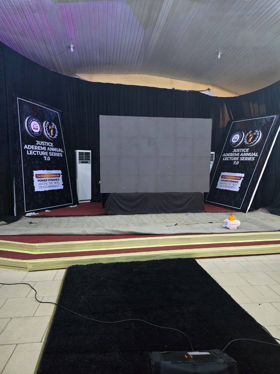 Imperial Premium Concept Limited branded backdrop with couple photo and Merry Holidays text